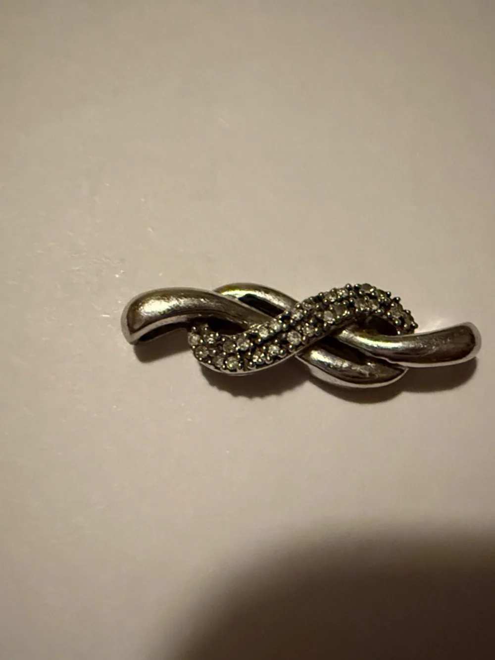 Crystal Pavé Twisted Ribbon Brooch in Silver